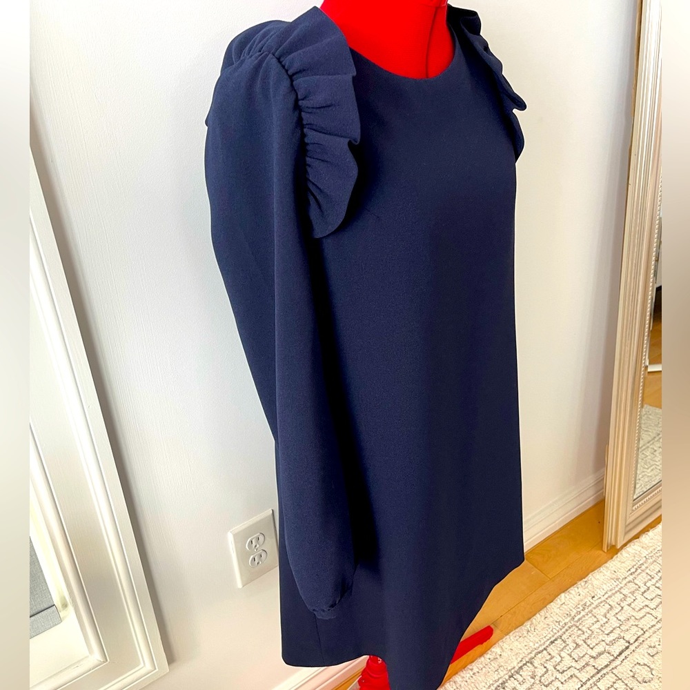 Chelsea 28! Short navy blue dress with ruffle shoulder detail